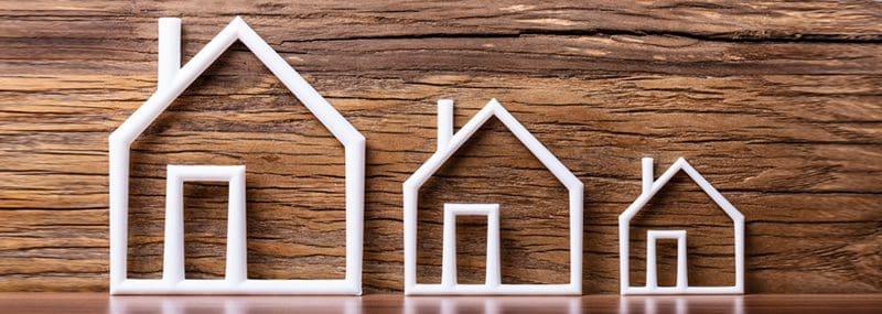 3 House decorative in front of wood